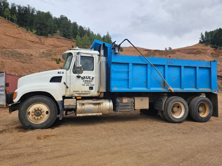 Tandem Dump Truck: $110/hr