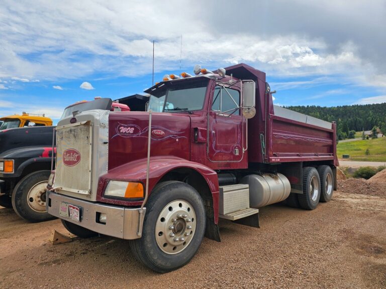 Tandem Dump Truck: $110/hr